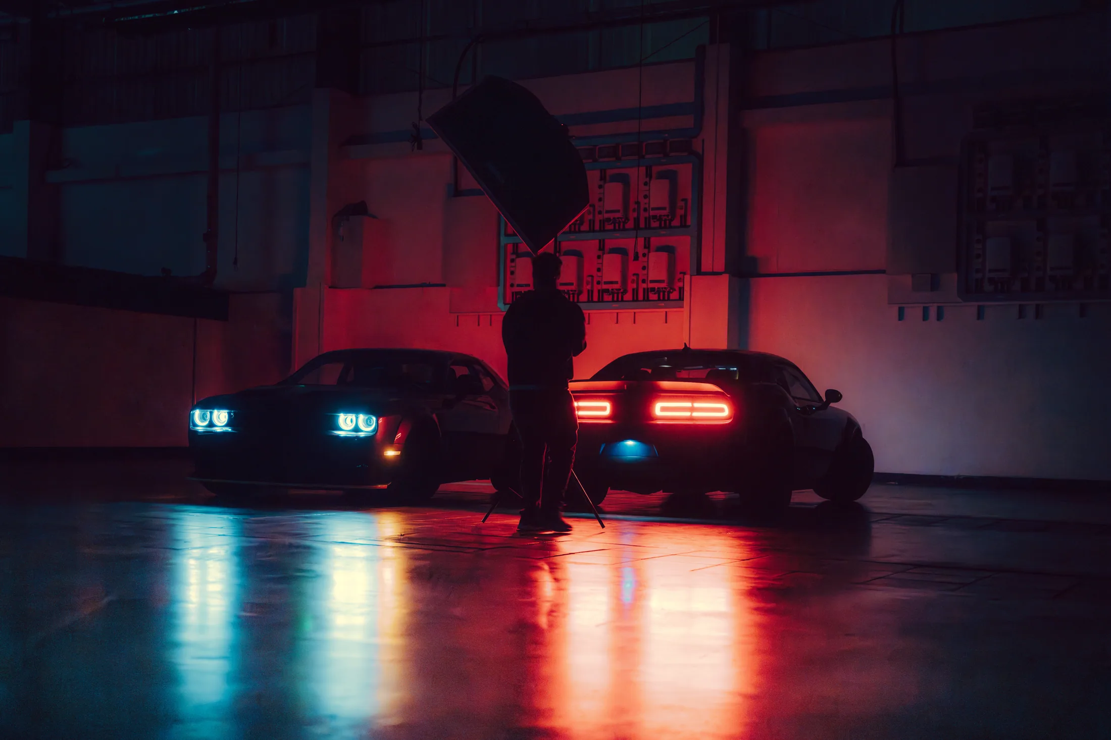 Cars illuminated in red and blue